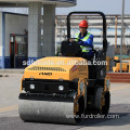 Double drum vibrating road roller for trench construction